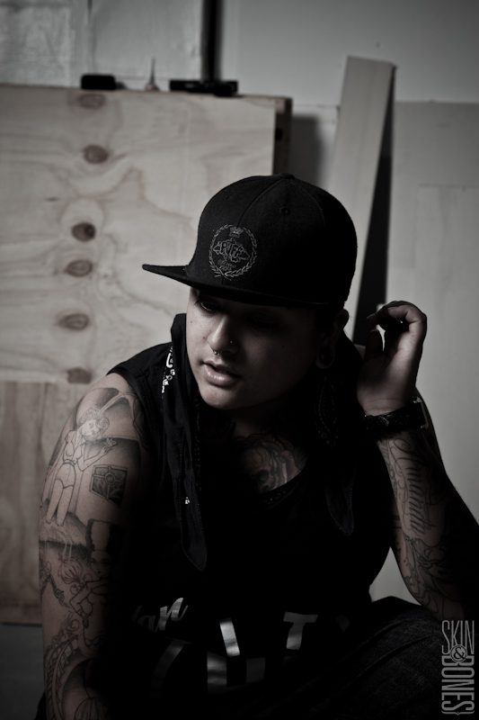 Basement, boiler room shoot with my friend.  Heavily tattooed and looking very gangster.