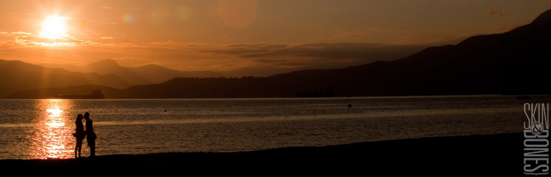 English Bay Vancouver.  I caught a sunset kiss moment with a couple enjoying some romance.
